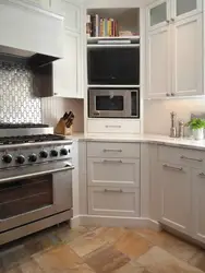 Photo of an oven built into a corner kitchen