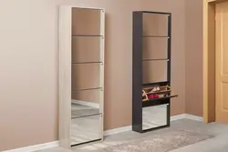 Shoe cabinet with mirror in the hallway photo