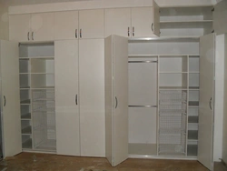 Built-in wardrobes with hinged doors in the hallway photo