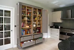 Kitchen cabinets, floor-standing, tall photos in the interior