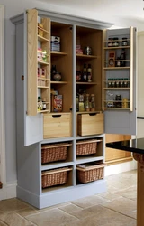 Kitchen cabinets, floor-standing, tall photos in the interior