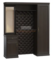 Photo of hallway cabinets with shoe rack and seat