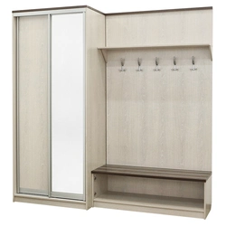 Photo of hallway cabinets with shoe rack and seat
