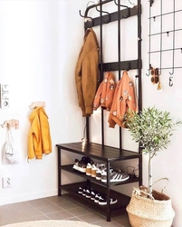 Shoe shelves and hangers in the hallway photo