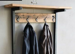Shoe shelves and hangers in the hallway photo