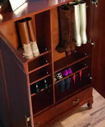 Shoe rack with mirror in the hallway photo