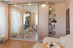Wardrobe in the bedroom with a mirror photo dimensions