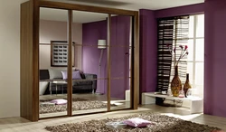 Wardrobe in the bedroom with a mirror photo dimensions