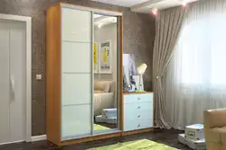 Wardrobe in the bedroom with a mirror photo dimensions