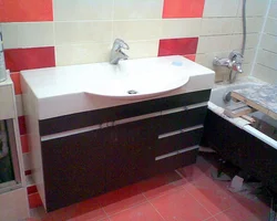 How to install a sink with a cabinet in the bathroom photo