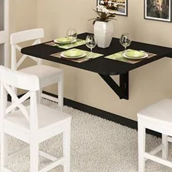 Dining table for a small kitchen against the wall photo
