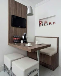 Dining table for a small kitchen against the wall photo