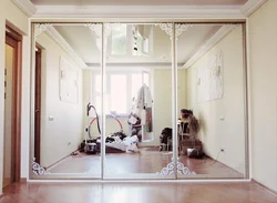 Wardrobe In The Hallway With Mirrors To The Ceiling Photo