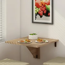 Kitchen tables photos that are attached to the wall