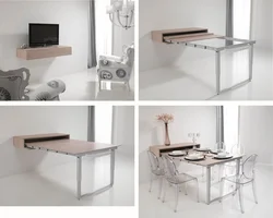 Kitchen tables photos that are attached to the wall