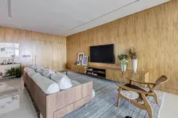 Wood paneling on the wall in the living room photo