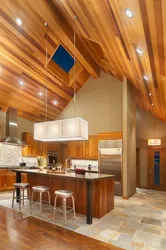 Ceiling design in the kitchen in a wooden house photo