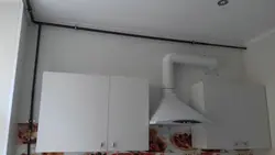 Suspended ceiling in the kitchen with a gas pipe photo