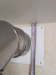 Suspended ceiling in the kitchen with a gas pipe photo