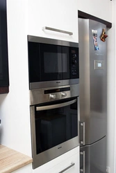 Kitchen oven and microwave in one cabinet photo