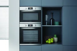 Kitchen oven and microwave in one cabinet photo