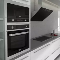Kitchen oven and microwave in one cabinet photo