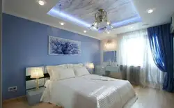 Wardrobe to the ceiling in the bedroom with suspended ceilings photo