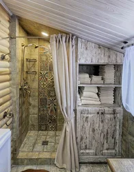 Bathroom in a country house in a wooden house photo with shower