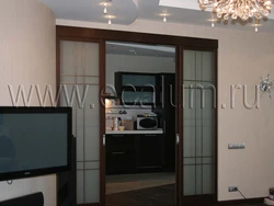 Sliding partitions between the kitchen and living room in Khrushchev photo