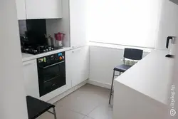 Kitchen 7 sq m with refrigerator and washing machine photo