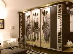Photo of wardrobes in the bedroom with a pattern on one mirror
