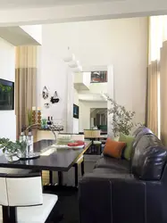 Dark sofa in the kitchen interior