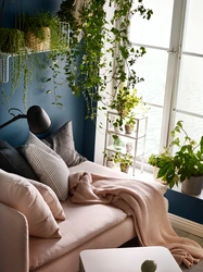 Artificial plants in the bedroom interior