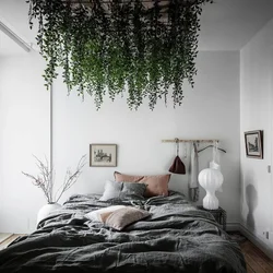 Artificial plants in the bedroom interior