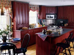 Burgundy curtains in the kitchen interior