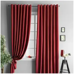Burgundy curtains in the kitchen interior