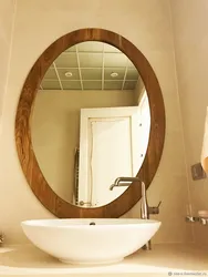 Bathtub with oval mirror interior
