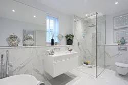 Glossy porcelain tiles in the bathroom interior