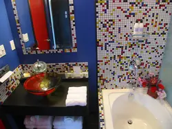 Self-adhesive film in the bathroom interior