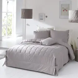 White bedspread in the bedroom interior