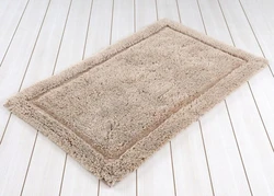 Rugs in the interior of a beige bath