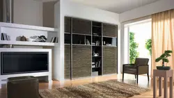 Низкий шкаф в интерьере гостиной