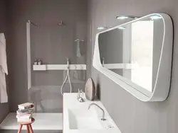 White mirror in the bathroom interior