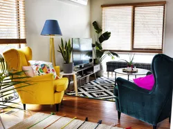Gray armchair in the bedroom interior