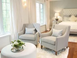 Gray armchair in the bedroom interior