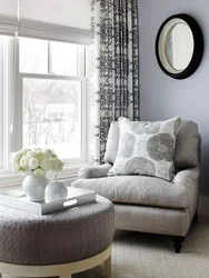 Gray armchair in the bedroom interior