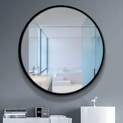 Black mirror in the bathroom interior