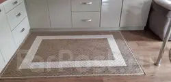 Carpets and mats in the kitchen interior