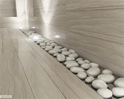 Pebble tiles in the bathroom interior