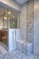 Pebble tiles in the bathroom interior